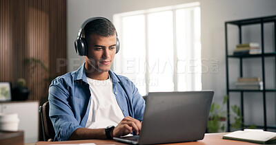 Buy stock photo Headphones, laptop and man in home with remote work for creative project with listening to music. Audio tech, computer and male editor streaming playlist for freelance publishing in apartment.