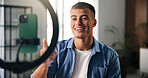 Happy man, influencer and chat with ring light in house for content creation, smile and video on phone. Person, point and live streaming on web, mobile app and post on social network at apartment