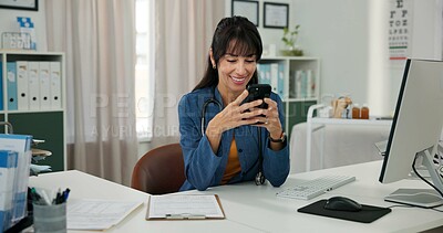 Buy stock photo Computer, doctor and woman in office with phone for patient review, medical research or diagnosis. Healthcare, clinic and mature person with digital tech, report and online message for telehealth