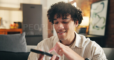 Buy stock photo Man, phone and voice recording on sofa at home with smile for chat, contact and relax in living room. Person, happy and loudspeaker with smartphone, reminder or memo with mobile app at apartment
