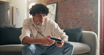Buy stock photo Hobby, video game and weekend with man on sofa in home living room for online competition. Concentration, controller and skill with gamer person in apartment for challenge, contest or tournament