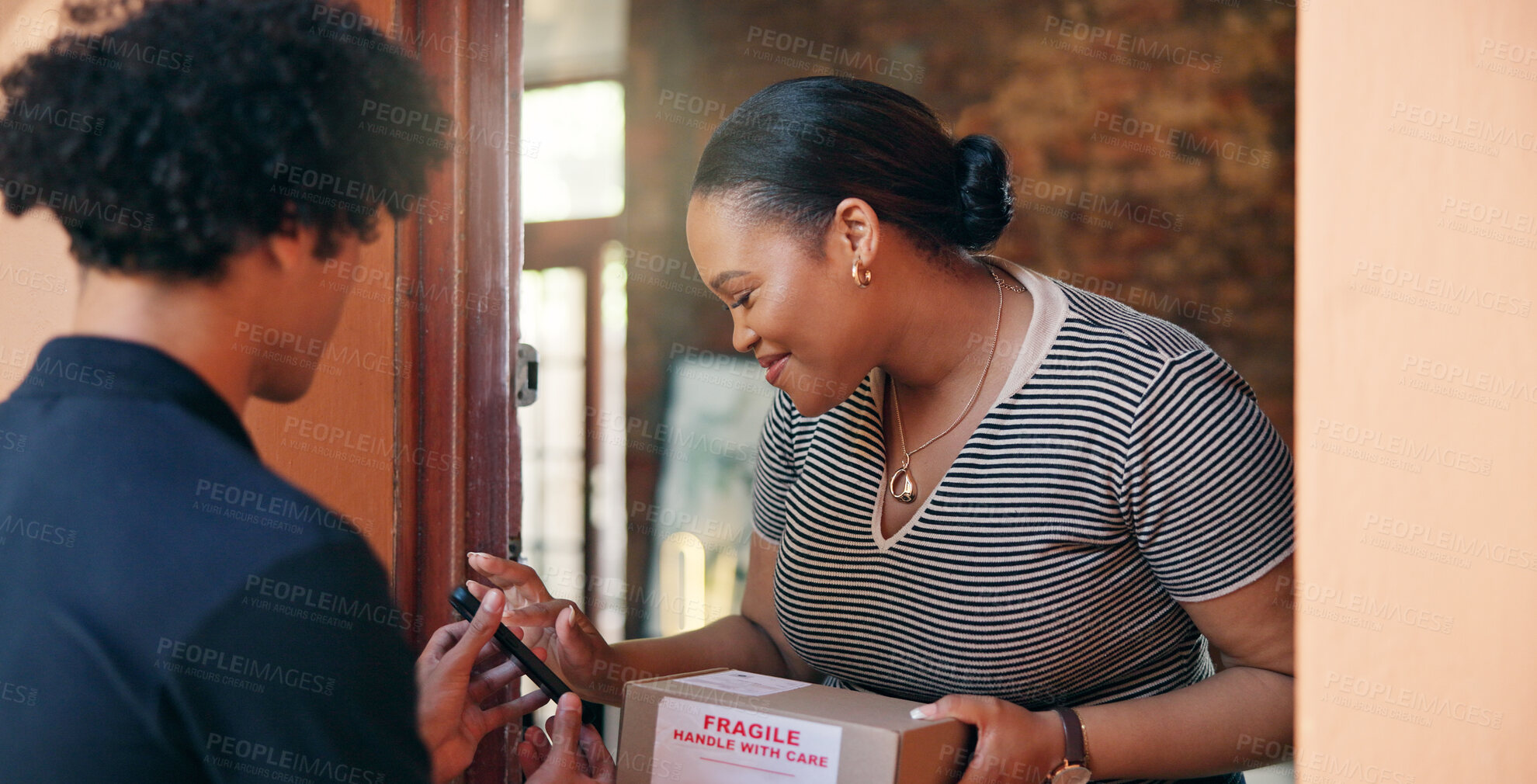 Buy stock photo Box, delivery man and woman with phone at front door for digital signature, supply chain or package. Courier service, employee and customer with tech in home for parcel distribution and confirmation