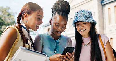 Buy stock photo Friends, college student and girl with phone at campus, share meme or funny video on web. People, group and happy with smartphone, education and bonding with post on social media at university