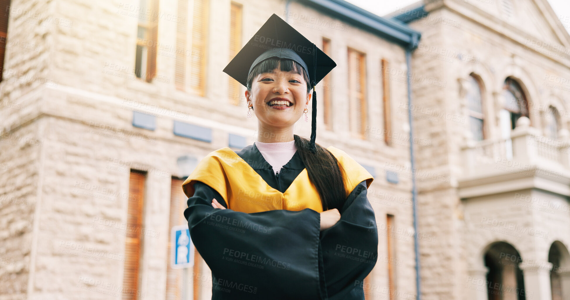 Buy stock photo Arms crossed, graduation and portrait of student woman on campus for college or university success. Education, milestone and scholarship with confident Asian graduate outdoor for ceremony or event
