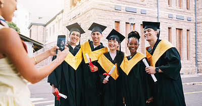 Buy stock photo Friends, phone and photo for graduation with diploma for success, education and diversity in city. Group, people and college student with milestone, celebration and hug with certificate for goals