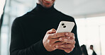 Hands, corporate and man with phone in office for research, browsing website and property price. Smile, male person and mobile to schedule viewing, contact client and buyer inquiry for resale auction