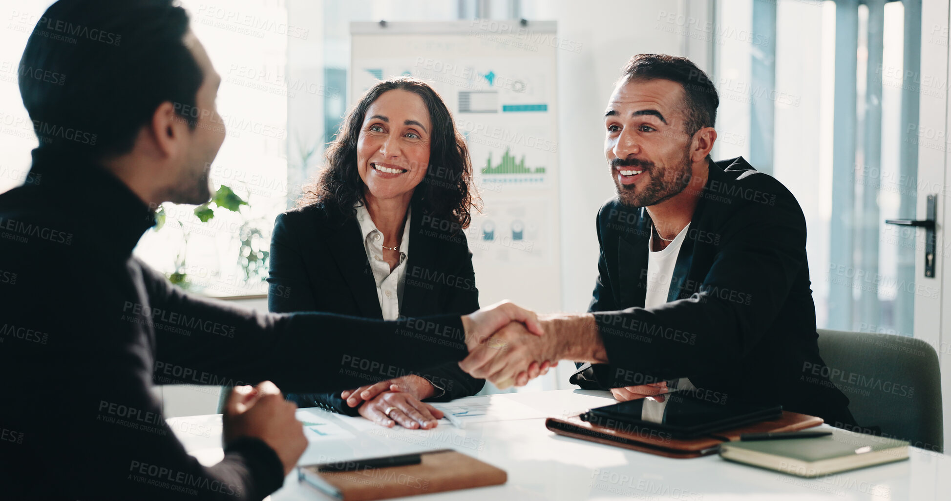 Buy stock photo Happy, business people and meeting with handshake in office for agreement, deal or recruiting. Group, employees or colleagues shaking hands with smile for teamwork, onboarding or hiring in workplace