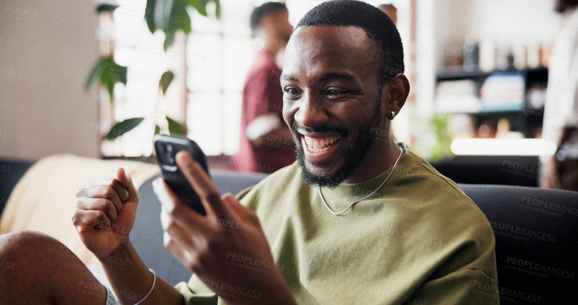 Buy stock photo Man, phone and excited with fist bump on sofa for streaming sport, goal or soccer match in home. Person, happy and celebration with smartphone, football game and subscription at reunion with friends