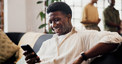 Buy stock photo Smile, reading and man with phone on sofa, check social media notification and watch online video. Digital communication, typing and person with mobile in home for message, blog and browsing internet