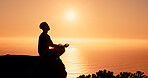 Sunrise, meditation and man on mountain by ocean for reflection, mindfulness and peace in morning. Silhouette, nature and person with calm for mental health, wellness and balance with horizon space