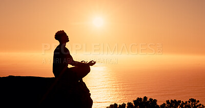 Buy stock photo Sunrise, meditation and man on mountain by ocean for reflection, mindfulness and peace in morning. Silhouette, nature and person with calm for mental health, wellness and balance with horizon space