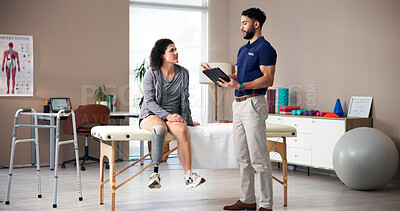 Buy stock photo Physiotherapist, tablet and patient with prosthetic leg for consultation, checkup or exam in clinic. Man, therapist and talking to person with a disability on technology for muscle rehabilitation