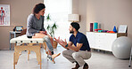 Physiotherapist, amputee and leg with people, discussion and rehabilitation for person with disability. Talk, help or consultation for medical prosthetic, appointment or man with woman in office