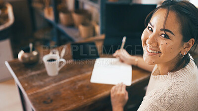 Buy stock photo Pottery, research and portrait of businesswoman in office with planning for creative project with agenda. Happy, writing and female ceramist with reminder in notebook for ceramic order with startup.