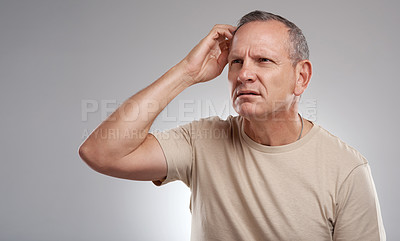 Buy stock photo Confused, scratching head and thinking with man in studio for doubt, question or uncertainty. Puzzled, solution and vision with mature person on white background for problem solving or query
