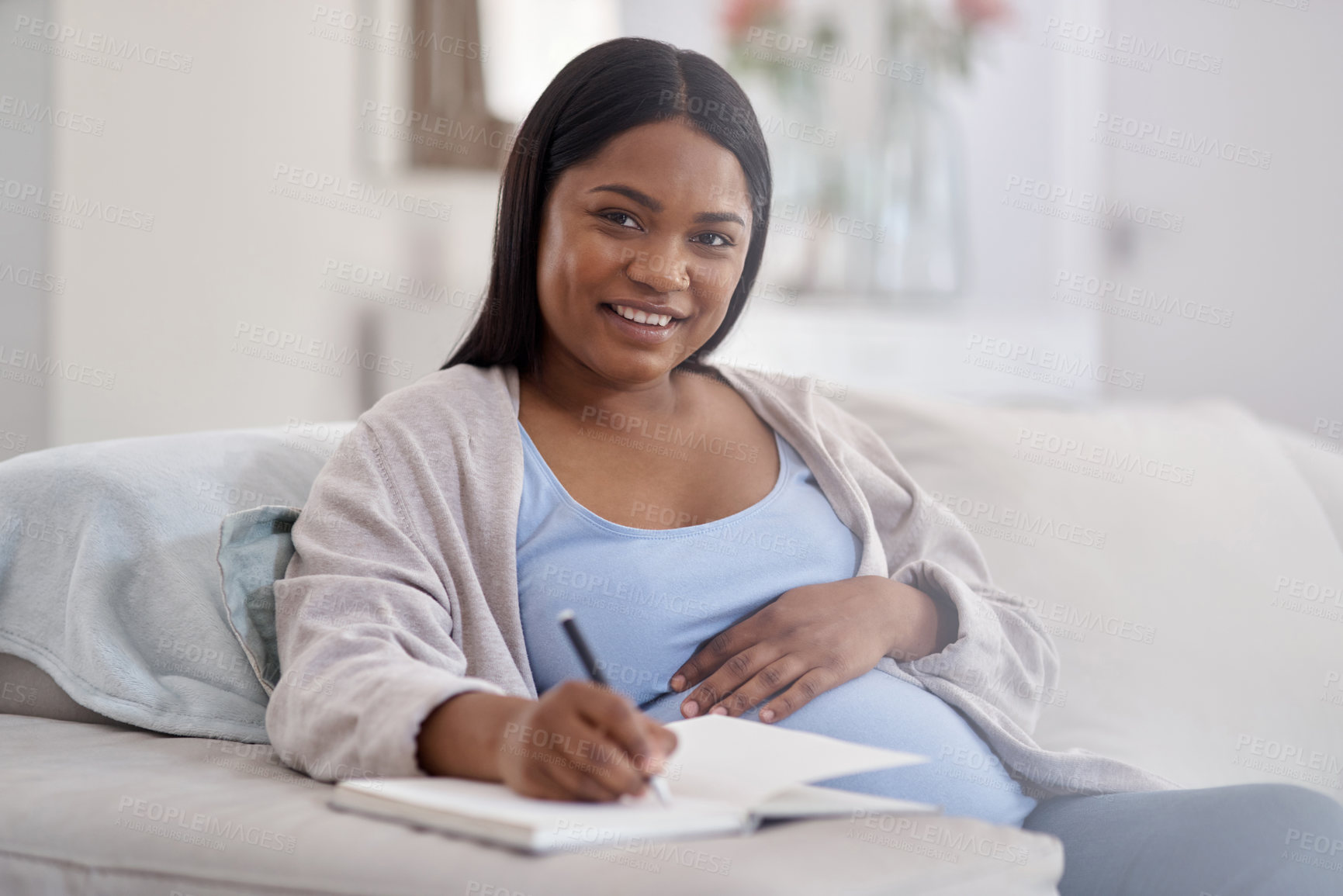Buy stock photo Notebook, writing and pregnant woman on sofa in home for journalling, ideas and notes for birth plan. Happy, pregnancy and person with diary for inspiration, reflection and portrait in living room