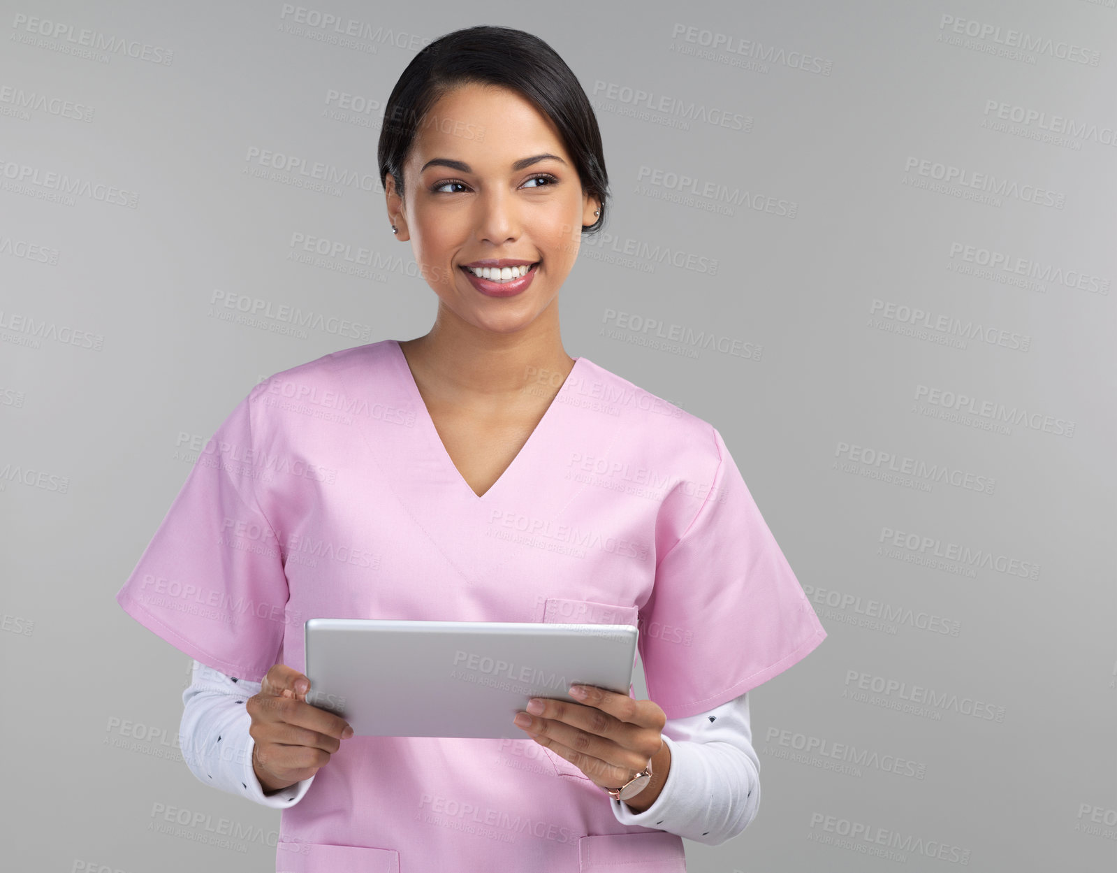 Buy stock photo Woman, nurse and thinking in studio with tablet, knowledge or medical research for gynecology study. Happy, person and tech for female reproductive health idea, website or vision on white background.