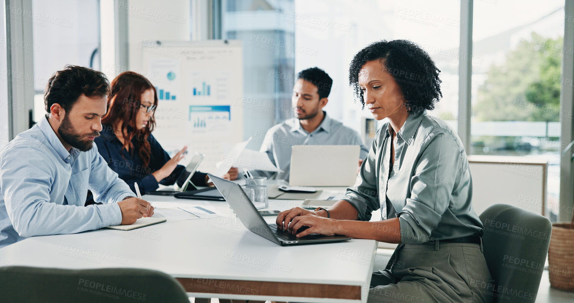 Buy stock photo Charts, laptop and business woman in meeting for finance report, budget review and proposal feedback. Corporate, team and person on computer for research, planning and financial analysis for audit