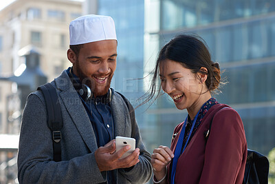 Buy stock photo Employees, funny and people in city, cellphone for social media and laughing with communication. Outdoor, consultant or online humor with discussion, internet and smartphone for website info or smile