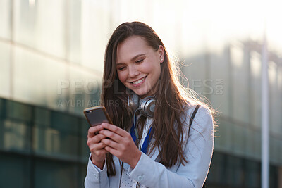Buy stock photo Phone, happy and business woman in city for social media, internet and connection on break. Intern, professional and person on smartphone for online chat, message and email notification in town