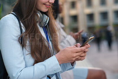 Buy stock photo Businesswoman, commute and hands with smartphone in city, journalist or chat with contact on website. Outdoor, reporter and person with mobile for communication, typing and texting with source on app