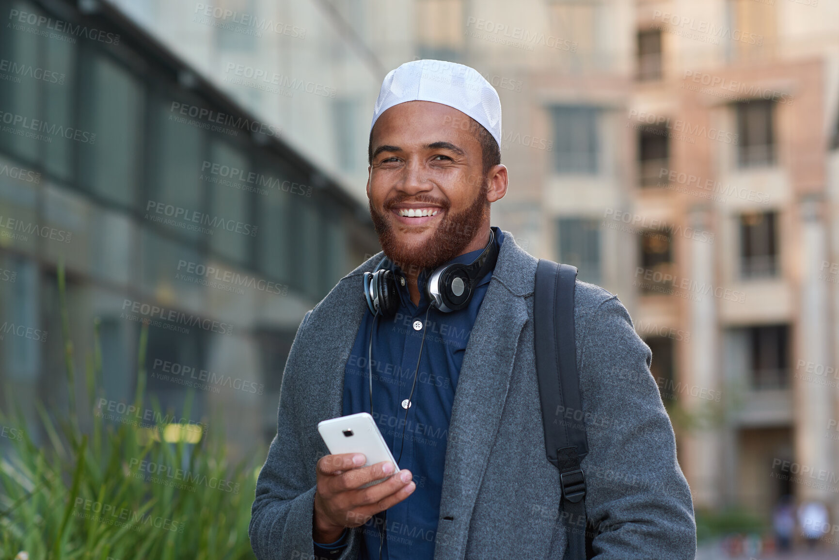 Buy stock photo Portrait, phone and Islamic businessman in city with commute, smile and check schedule for finance job. Happy, Muslim person and accountant in urban town with tech, online agenda and travel to work.