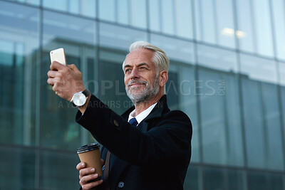 Buy stock photo Businessman, commute and selfie in city with coffee, travel or profile picture for real estate job. Space, mature person or realtor in urban town with photography, beverage or outdoor journey to work