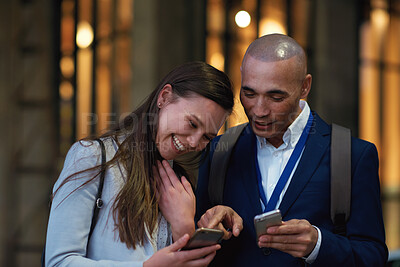 Buy stock photo Business people, night and smartphone in city, funny meme and digital app for social media. Outdoor, man or woman with cellphone, evening or connection for communication, conversation or online humor