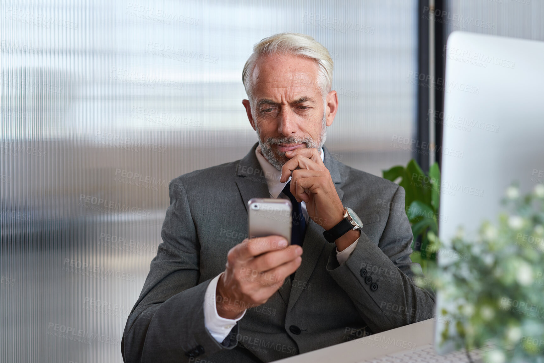 Buy stock photo Thinking, investor and man in office, smartphone for online trading platform or planning. Mature person, reflection or financial advisor in workplace, cellphone for economy info or app for investment