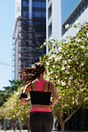 Woman runner running in the city