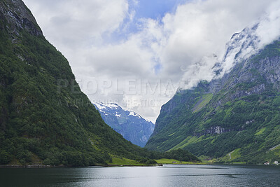 Buy stock photo Mountain, lake and landscape in nature for vacation, holiday destination and eco tourism location. Water, snow and glacial valley outdoor for natural beauty, scenic environment and travel to Norway