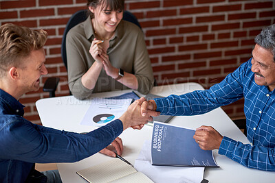 Buy stock photo Happy, businessmen and handshake with client in office, team and meeting for investment opportunity. People, above and shaking hands with investor for financial growth, celebration and achievement