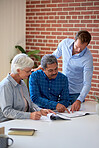 senior couple signing contract planning retirement for life insurance savings plan with financial advisor showing where to write signature