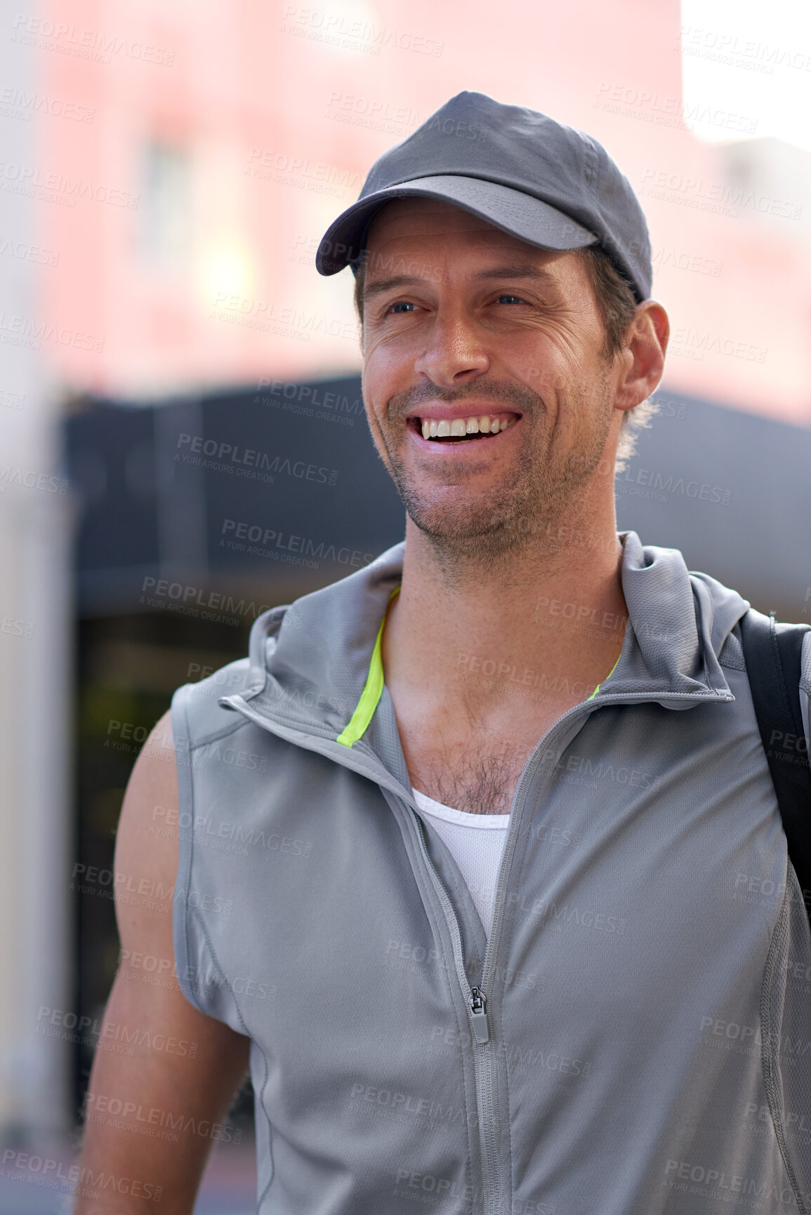 Buy stock photo Man, smile and fitness in city with thinking, reflection or inspiration for health and wellness. Male person, sport and athlete outside urban gym, happy or satisfied with training for athletics