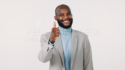 Buy stock photo Thumbs up, happy and portrait of black man in studio with agreement, approval or vote for finance career. Smile, professional and financial manager with yes hand gesture for job by white background.