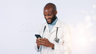 Buy stock photo Hospital, doctor and black man in studio with phone for medical support, telehealth and bokeh. Healthcare, space and person with cellphone for consulting, medicare or wellness on white background
