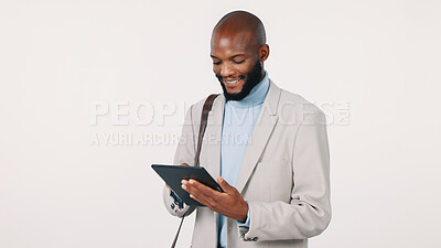 Buy stock photo Tablet, happy and black man in studio for research on finance report with budget planning. Smile, digital technology and African male financial manager with investment growth by white background.