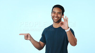 Buy stock photo Fitness, pointing and portrait of man with okay sign for exercise, health club and gym membership. Mockup, space and person with emoji for motivation, yes and approval to join us on studio background