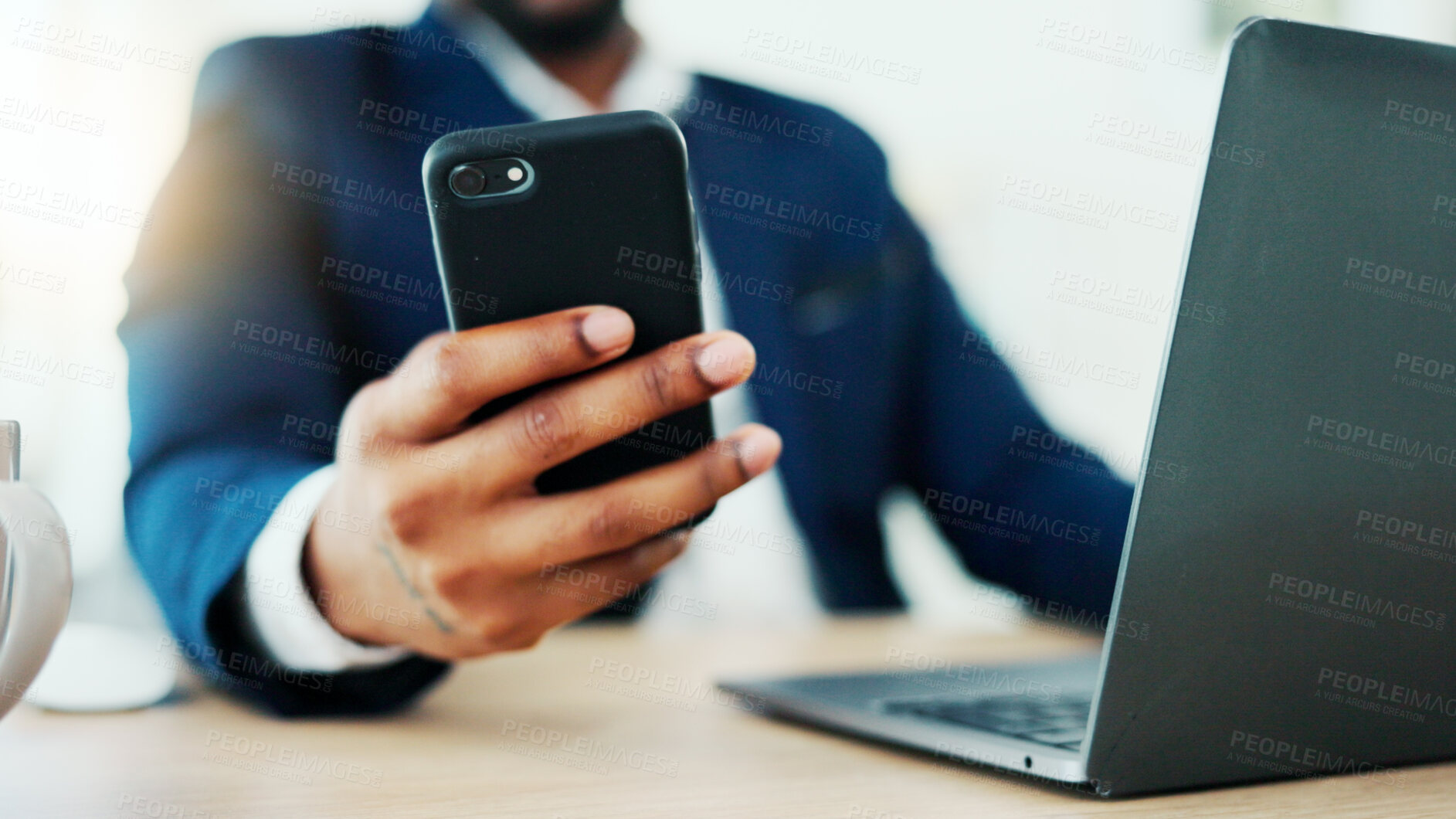 Buy stock photo Businessman, hands and phone with laptop for communication, financial advice or networking in office. Person, tech and research with message for client feedback, portfolio review or notification