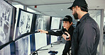 Security, control room and team with radio by monitor for communication, surveillance or report. Safety officer, computer screen and people point or talk about security breach, inspection or dispatch