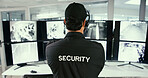 Back, man and security guard in control room for video surveillance, observation or safety compliance. Law enforcement, officer and person in workplace for crime prevention, monitor CCTV and footage.