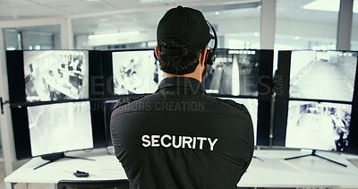 Buy stock photo Back, man and security guard in control room for video surveillance, observation or safety compliance. Law enforcement, officer and person in workplace for crime prevention, monitor CCTV and footage.