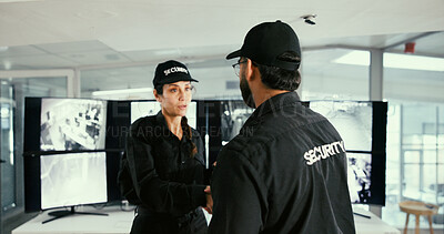 Buy stock photo Man, woman and security guard with handshake in control room for introduction, screen and onboarding. People, team and shaking hands for safety, surveillance and recruitment for crime prevention job