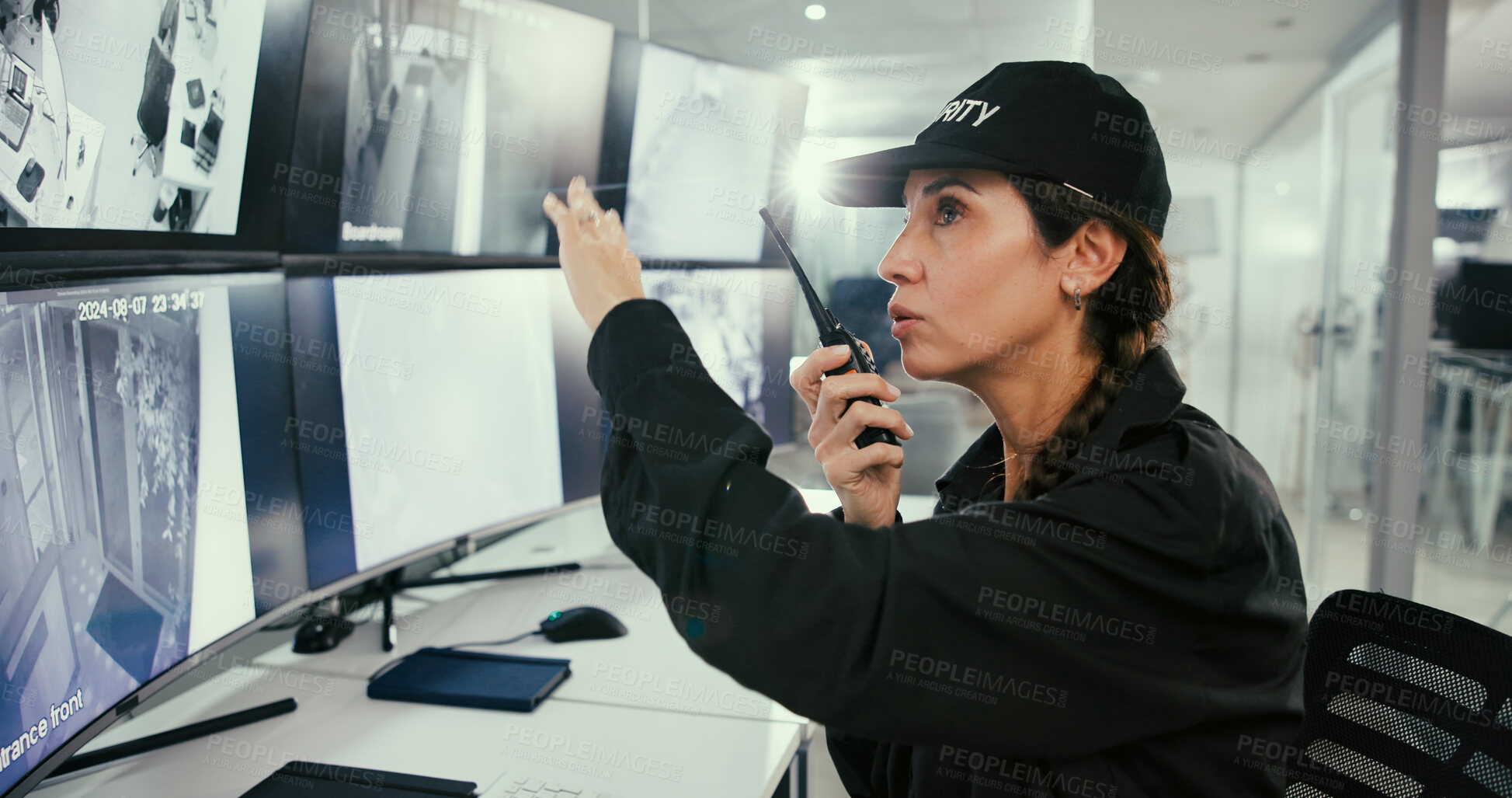 Buy stock photo Security guard, woman and computer in control room, walkie talkie and inspection. Employee, safety officer and person in workplace, radio and monitor for building protection, camera and communication
