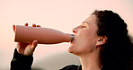 Woman, fitness and drinking with water for hydration, workout break or outdoor rest in nature. Active, female person or hiker with aqua beverage or mineral liquid for sustainability or recovery