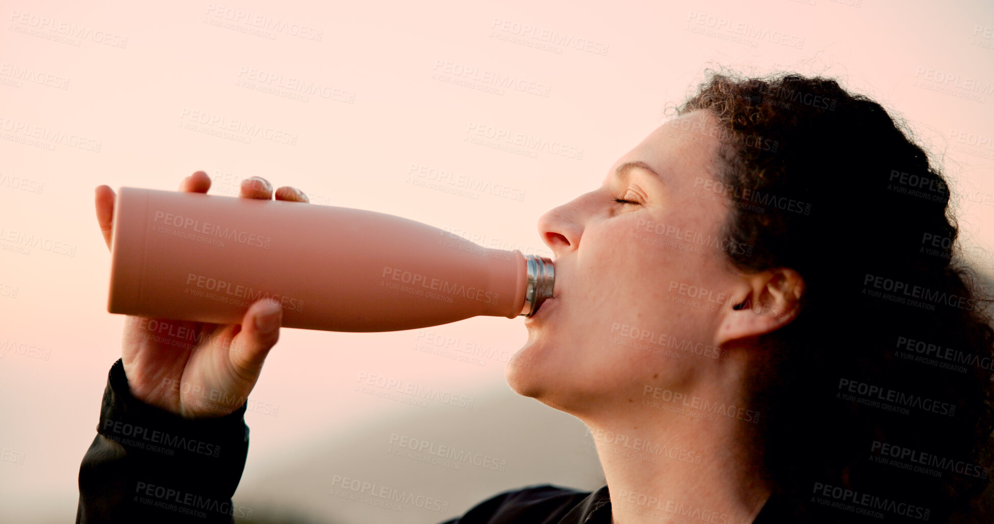Buy stock photo Woman, fitness and drinking with water in nature for hydration, workout break or outdoor rest. Active, female person or thirsty hiker with beverage or mineral bottle for nutrition or sustainability