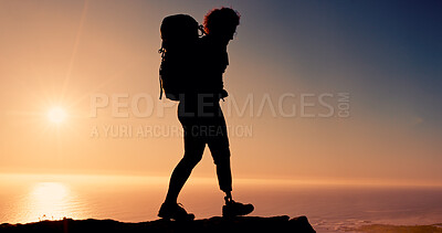 Buy stock photo Sunset, hiking and woman on prosthetic leg on mountain, mockup space or travel for adventure outdoor. Sky, sunshine and person with disability in nature, silhouette and trekking on holiday or explore