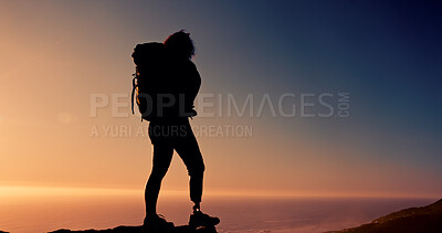 Buy stock photo Sunset, backpacker and woman with prosthetic on mountain, mockup space or hike for adventure in nature. Sky, sunshine and person with disability on vacation, silhouette and trekking for exploration