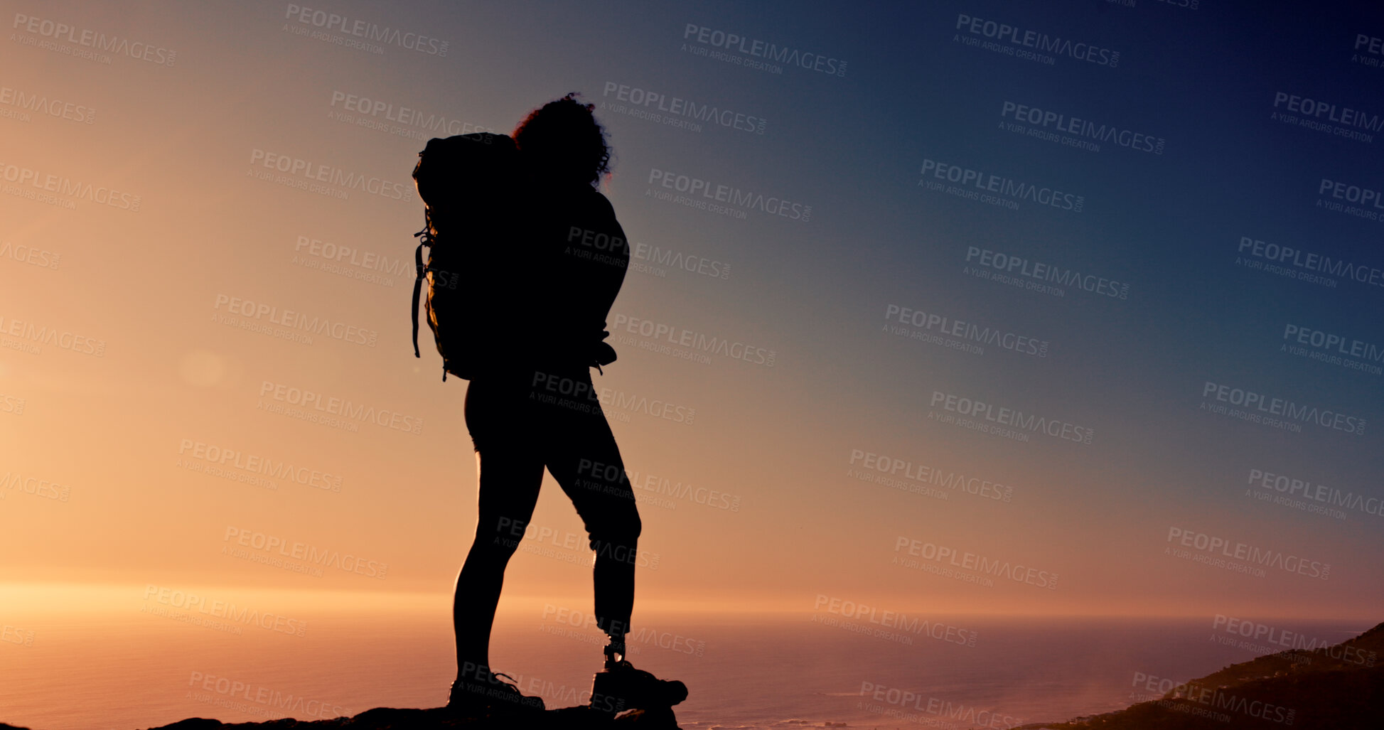 Buy stock photo Sunset, backpacker and woman with prosthetic on mountain, mockup space or hike for adventure in nature. Sky, sunshine and person with disability on vacation, silhouette and trekking for exploration