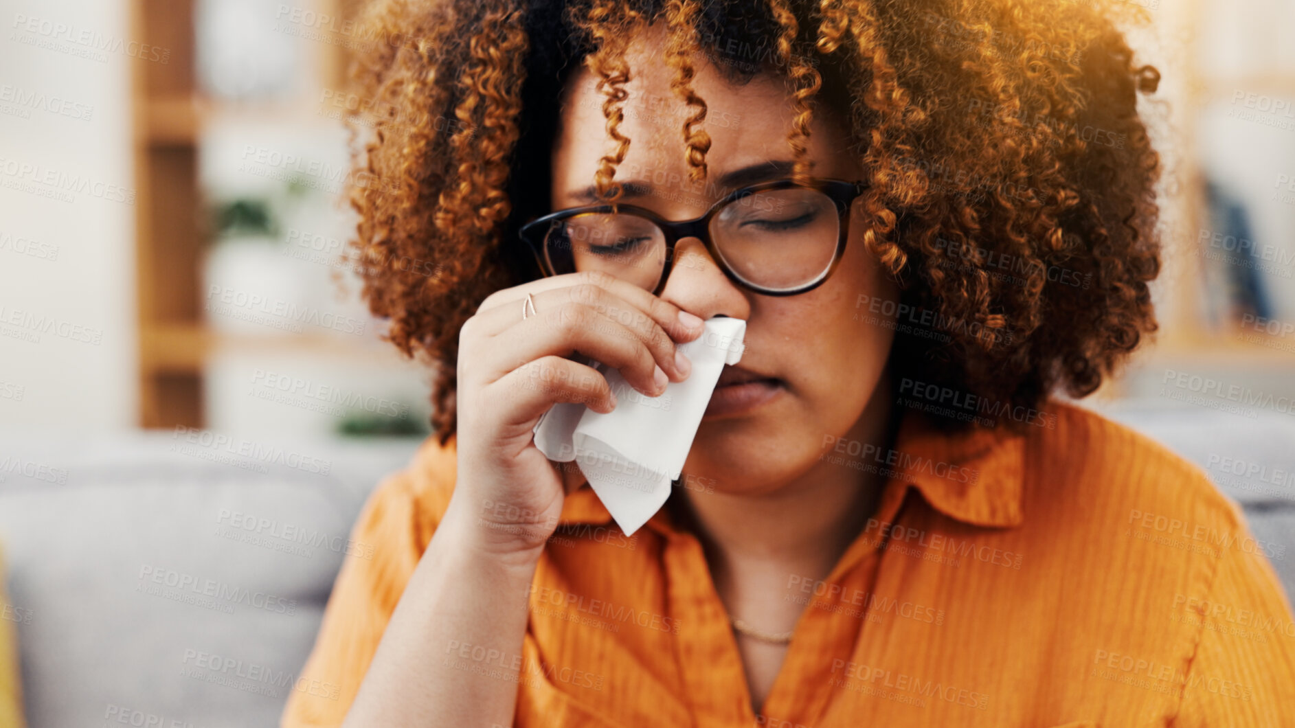 Buy stock photo Blowing nose, tissue and allergy with woman in home for flu season, pneumonia infection and illness. Hayfever, sneeze and disease with person in living room in house for recovery, sick and cold